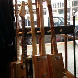 The Gallery at Liberty Bay - Some Cigar Box Electric Guitars, drew me in.....