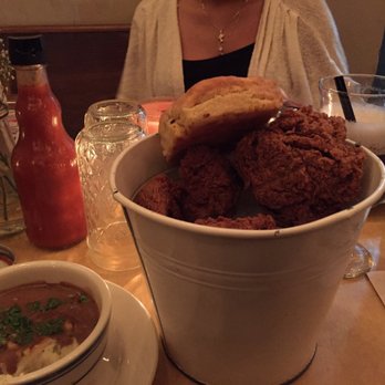 Sweet Chick - Sweet Chick Bucket w/ a biscuit and side of mashed potatoes w/ gravy. Purple Drank to the right of the bucket. - Southern Near Me - New York, New York