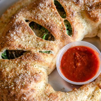 Goodfellas Pizzeria - Stuffed, sauced, and baked to perfection. - Pizza Near Me - Covington, Kentucky Goodfellas Pizzeria - Stuffed, sauced, and baked to perfection. - Pizza Near Me - Covington, Kentucky