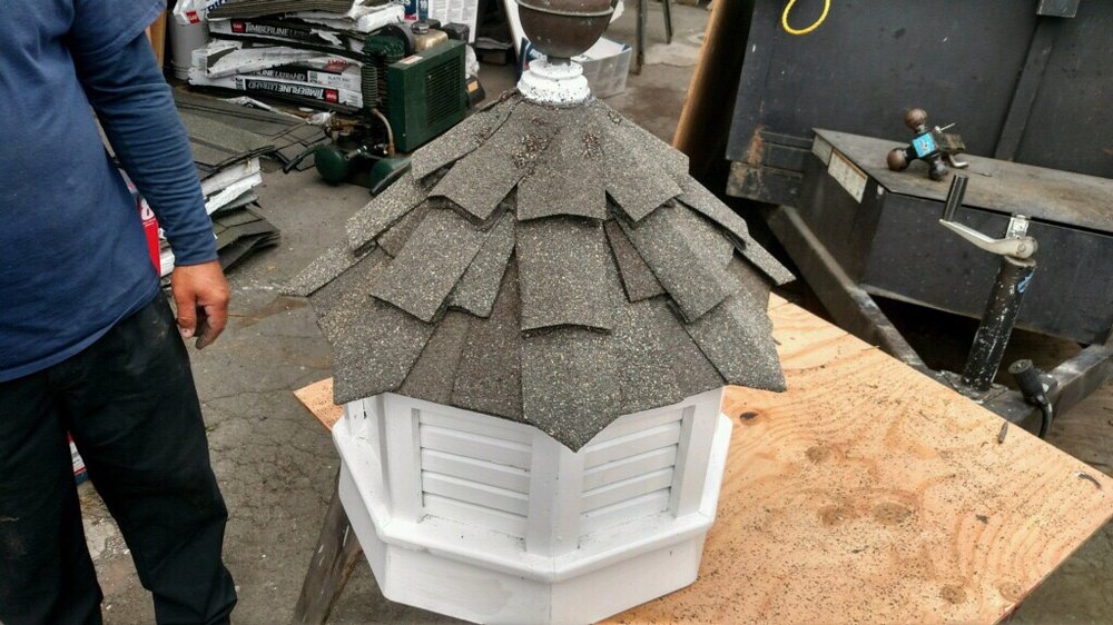 Slide of K Reed Roofing