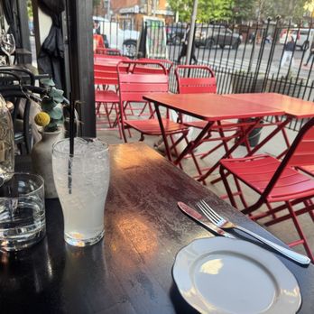 Nittis Italian Restaurant in Hell's Kitchen - Table adjacent to outdoor seating - Italian Near Me - New York, New York Nittis Italian Restaurant in Hell's Kitchen - Table adjacent to outdoor seating - Italian Near Me - New York, New York
