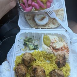 Chicken kebab with side of pickled veggies. Chicken kebab with side of pickled veggies.