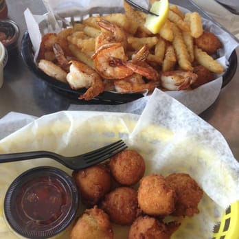Safe Harbor Seafood - Basket of grilled shrimp (with fries and hush puppies) and a side of hush puppies! So bomb! Gut bomb central. - Seafood Near Me - Jacksonville, Florida