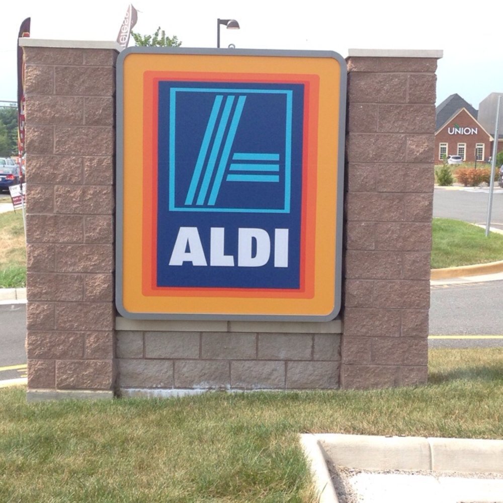ALDI - a sign in front of a building - Grocery Near Me - Fredericksburg, Virginia