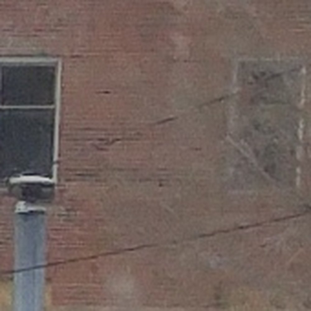 Ghost face visible in window to the left