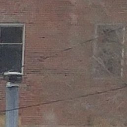 Ghost face visible in window to the left Ghost face visible in window to the left