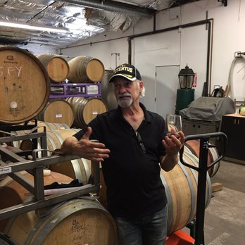 Dark Water Winery - Dave explains the old world way of getting a better wine by letting the wine sit on the skins for a longer time. - Wine Tasting Room Near Me - Lompoc, California Dark Water Winery - Dave explains the old world way of getting a better wine by letting the wine sit on the skins for a longer time. - Wine Tasting Room Near Me - Lompoc, California