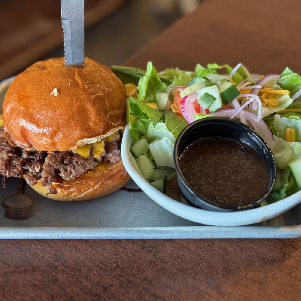 Crafty Cow - Burgers & Fried Chicken - OK Burger with salad - Burgers Near Me - Oconomowoc, Wisconsin Crafty Cow - Burgers & Fried Chicken - OK Burger with salad - Burgers Near Me - Oconomowoc, Wisconsin