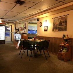 Red Rooster Cafe and Catering - Front door with pie cooler, bar would be to the left when entering the front door.