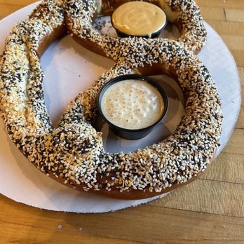 Five Churches Brewing - Everything pretzel with dipping sauce - Breweries Near Me - New Britain, Connecticut Five Churches Brewing - Everything pretzel with dipping sauce - Breweries Near Me - New Britain, Connecticut