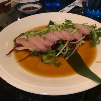 Utamaro Sushi Bar - Usuzukuri (yellowtail with jalapeño and ponzu sauce) - Sushi Bars Near Me - Sarasota, Florida Utamaro Sushi Bar - Usuzukuri (yellowtail with jalapeño and ponzu sauce) - Sushi Bars Near Me - Sarasota, Florida