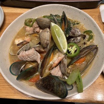 Mahi’ai Table - Makai Bowl - mussels,clams, shrimp, fresh catch fish In lemongrass broth - Cocktail Bars Near Me - Kapolei, Hawaii