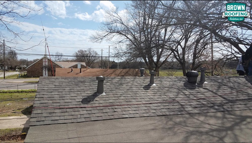 Slide of Brown Roofing Solutions