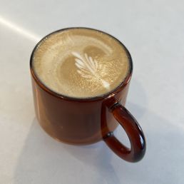 A previously made cappuccino that was delectable A previously made cappuccino that was delectable
