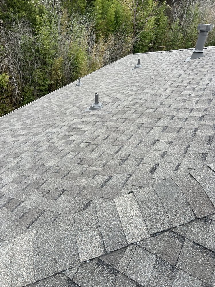 Slide of Stallion Roofing Company