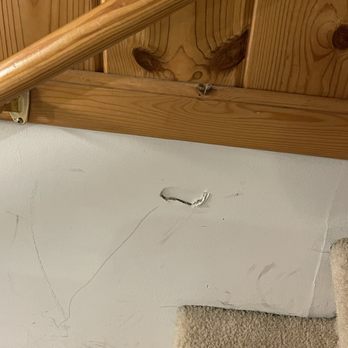 Italian Estates Property Management - Hole in wall when we arrived - Property Management Near Me - Manhattan, Kansas