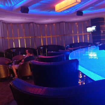Chill Ultra Lounge - a woman sitting at a bar - Lounges Near Me - Biloxi, Mississippi Chill Ultra Lounge - a woman sitting at a bar - Lounges Near Me - Biloxi, Mississippi