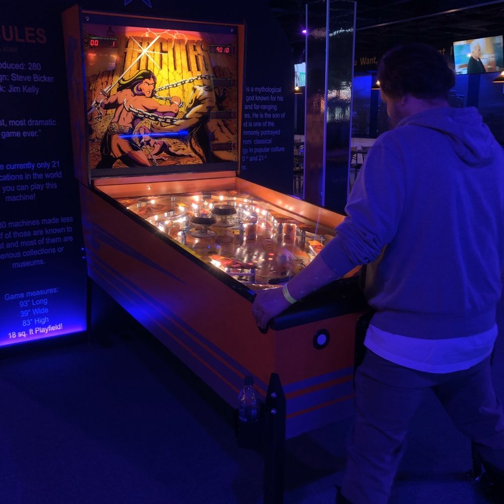 Free Play Pinball Arcade - The enormous Hercules pinball machine. Doesn't look big in the picture, but it is. The ball for the game is the size of a cue ball for pool! - Arcades Near Me - Fraser, Michigan Free Play Pinball Arcade - The enormous Hercules pinball machine. Doesn't look big in the picture, but it is. The ball for the game is the size of a cue ball for pool! - Arcades Near Me - Fraser, Michigan