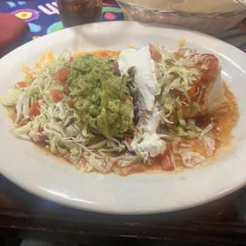 Puerto Vallarta - My macho burrito (cut down the middle in btwn the guac and sour cream) - Mexican Near Me - Orange, Connecticut