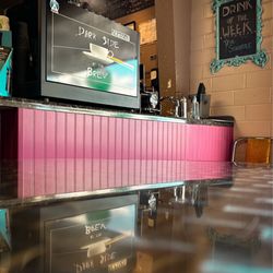 Dark Side of the Brew - Inside. Tabled seating area.