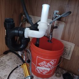 Our original drain configuration and angle stops in their non functional state. Our original drain configuration and angle stops in their non functional state.