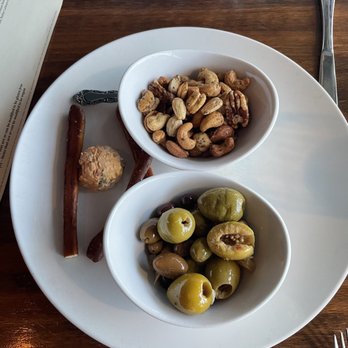 Odd Duck - Sweet rosemary and citrus roasted onions, pimento cheese ball, fennel and citrus roasted olives - New American Near Me - Milwaukee, Wisconsin Odd Duck - Sweet rosemary and citrus roasted onions, pimento cheese ball, fennel and citrus roasted olives - New American Near Me - Milwaukee, Wisconsin