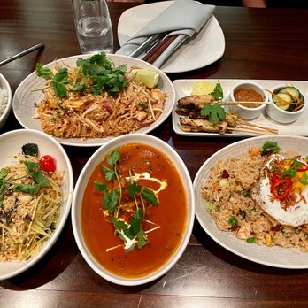 Wild Ginger - Papaya salad, Phad Thai, fried rice, chicken skewers, and butter chicken. - Wine Bars Near Me - Bellevue, Washington Wild Ginger - Papaya salad, Phad Thai, fried rice, chicken skewers, and butter chicken. - Wine Bars Near Me - Bellevue, Washington