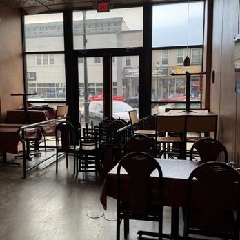 Luigis Italian Restaurant - Piles of chairs and stacked tables, etc, blocking the doors - Italian Near Me - Mattoon, Illinois Luigis Italian Restaurant - Piles of chairs and stacked tables, etc, blocking the doors - Italian Near Me - Mattoon, Illinois