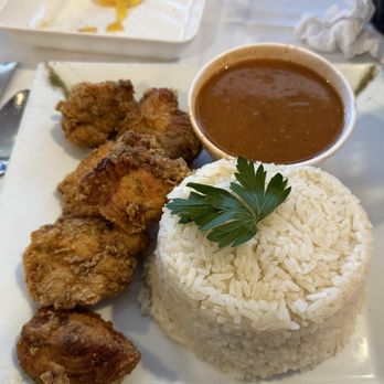 Lo Sano Restaurant & Bar - Crispy chicken bites with white rice and beans! - Bars Near Me - Hartford, Connecticut Lo Sano Restaurant & Bar - Crispy chicken bites with white rice and beans! - Bars Near Me - Hartford, Connecticut