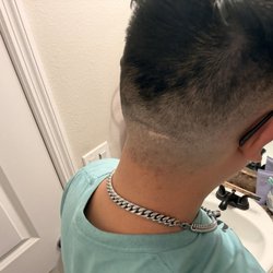 A & J's Barber Lounge - This my back