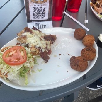 Buzzard Billy's - Grilled chicken sandwich with hush puppies - American Near Me - La Crosse, Wisconsin