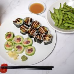 Mr. Wasabi - Wasabi Asian Bistro - Top right: Edamame
Top of plate: Spider roll
Bottom of plate: Naruto roll