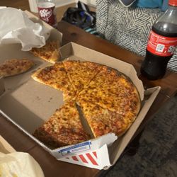 Domino's Pizza - Was it cold? Yes.... Was it burnt? Yes... did anyone eat it? Nope... major waste of money
