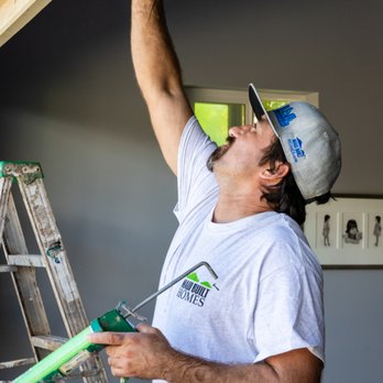 Maui Built Homes - a man fixing a ceiling - General Contractors Near Me - Kihei, Hawaii Maui Built Homes - a man fixing a ceiling - General Contractors Near Me - Kihei, Hawaii