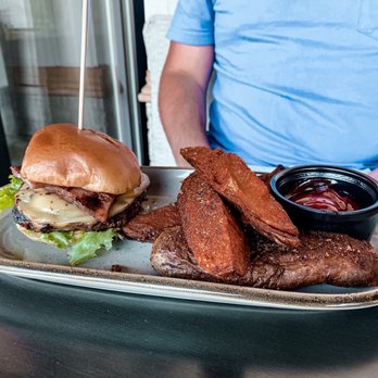 Donovan's Meatery - Donovan's burger (lunch menu) with smoked Gouda and house made bacon with potato wedges. - Steakhouses Near Me - Riverview, Florida