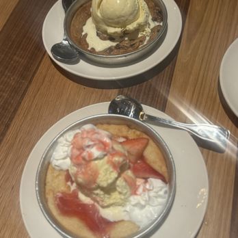 BJ's Restaurant & Brewhouse - Person sized Strawberry Pizookie and chocolate chip Pizookie - New American Near Me - Downey, California