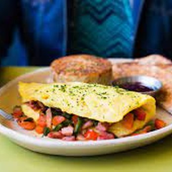Snooze, an A.M. Eatery - Yummy Three Egg Omelette with the Legendary Hashbrowns and a side of Sourdough Toast and Jam - Breakfast & Brunch Near Me - Tempe, Arizona