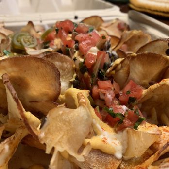 Flourish Plant-Based Kitchen - Nachos yum - Vegan Near Me - Portland, Oregon Flourish Plant-Based Kitchen - Nachos yum - Vegan Near Me - Portland, Oregon
