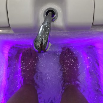 Polished Beauty Bar - My feet soaking in the purple illuminated water - Nail Salons Near Me - Burbank, California Polished Beauty Bar - My feet soaking in the purple illuminated water - Nail Salons Near Me - Burbank, California