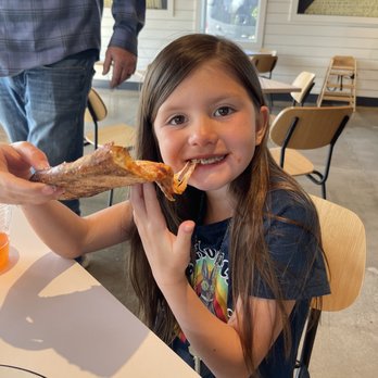 Acre Pizza - She loved her slice - Pizza Near Me - Petaluma, California