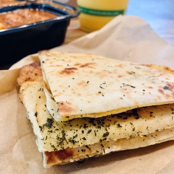 Curry Up Now Indian Restaurant & Catering - Burnt chili Garlic Kulcha Naan - Indian Near Me - Palo Alto, California