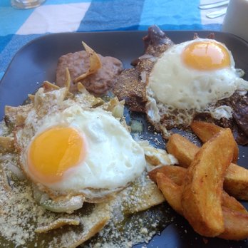 Azul - Chilaquiles 1/2 with Mole, 1/2 with Verde sauce - Breakfast & Brunch Near Me - Puerto Vallarta, JAL Azul - Chilaquiles 1/2 with Mole, 1/2 with Verde sauce - Breakfast & Brunch Near Me - Puerto Vallarta, JAL