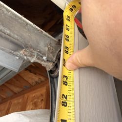 Town & Country Doors - Evidence that I have 7ft garage door. Garage door openings include an extra 4"-4 3/4" for clearance. This guy lied through his teeth.