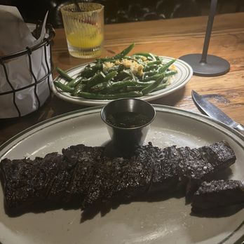 Raval Steakhouse - Skirt steak (RW menu) with green beans in the background. - Steakhouses Near Me - Staten Island, New York Raval Steakhouse - Skirt steak (RW menu) with green beans in the background. - Steakhouses Near Me - Staten Island, New York