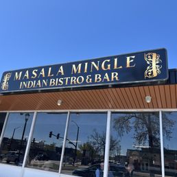 Exterior outside entrance of Masala Mingle Indian Bistro - Façade - Colorado Springs, Colorado Exterior outside entrance of Masala Mingle Indian Bistro - Façade - Colorado Springs, Colorado