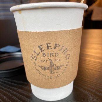 Sleeping Bird Coffee - a coffee cup with a straw in it - Breakfast & Brunch Near Me - Wilmington, Delaware