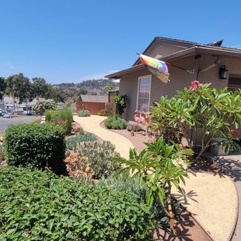 Noeman's Landscape and Construction - Driveway view of front landscape in which has been refreshed with decomposed granite - Irrigation Near Me