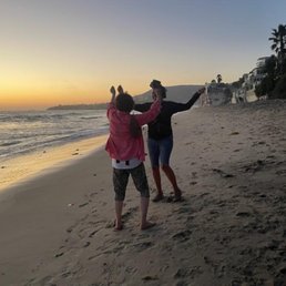 Me and a random strangers dancing with joy on thr sands of Laguna Beach....life is good folks.
