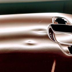 B Dentless LLC Paintless Dent Repair - Two medium size dents on a 2018 Colorado passenger door. I will be repairing the larger dent under the handle opening first.