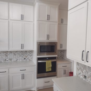 Artiztek Tile & Tile Designs - white Carrera herringbone pattern - Tiling Near Me Artiztek Tile & Tile Designs - white Carrera herringbone pattern - Tiling Near Me